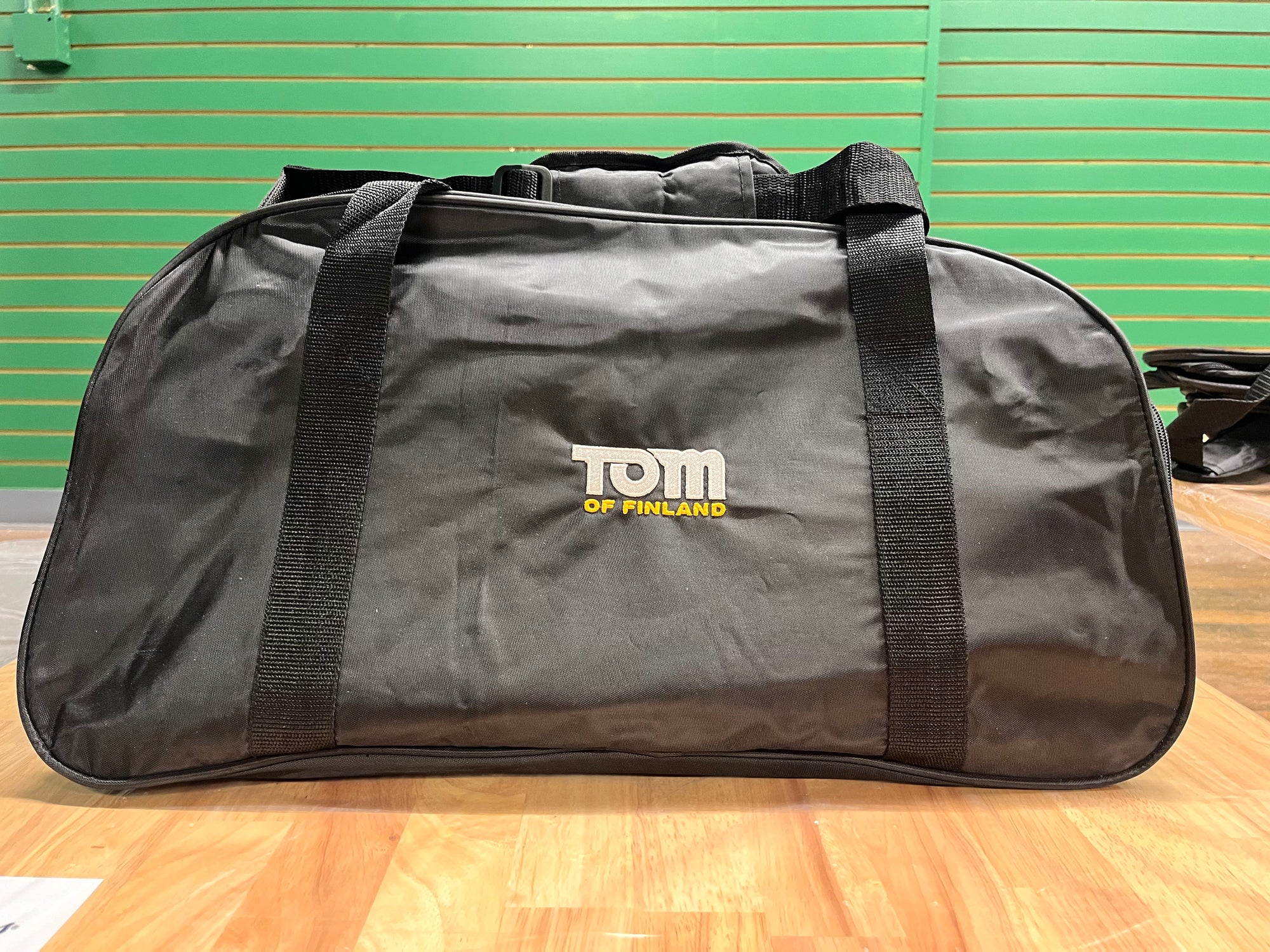 Our Tom of Finland Travel Bag in black designed with discretion in mind, it features a subtle logo 